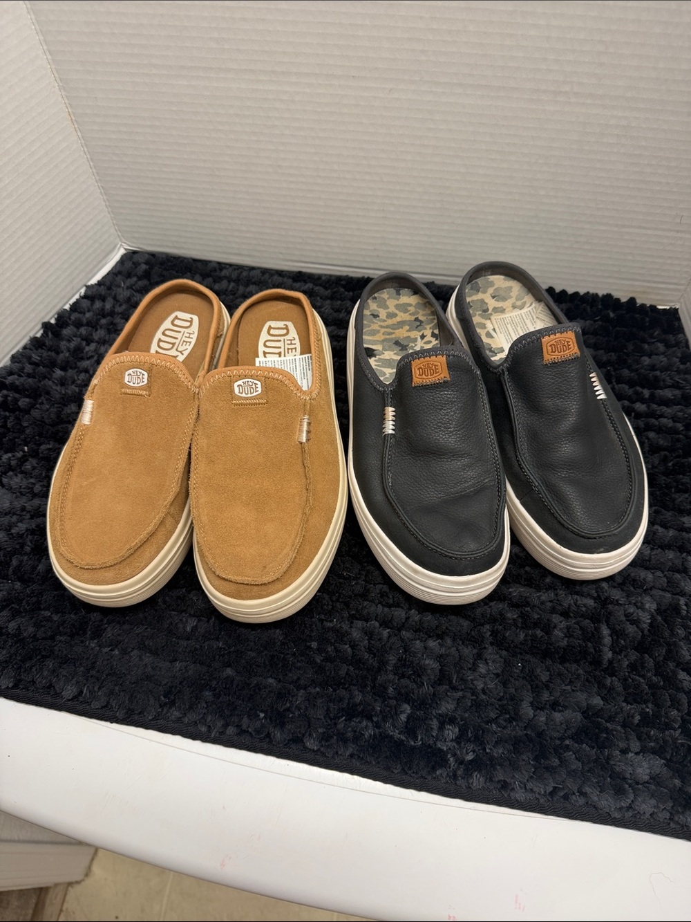 Hey Dude women’s Slip-On Loafers in Black and Brown Tan